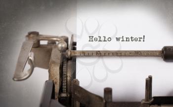 Close-up of a vintage typewriter, old and rusty, hello winter