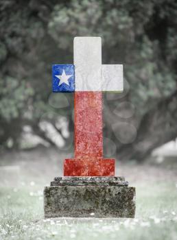Old weathered gravestone in the cemetery - Chile