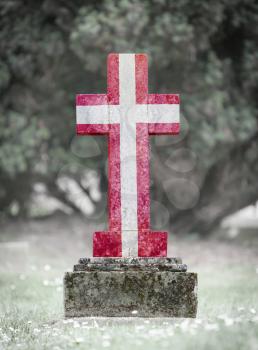 Old weathered gravestone in the cemetery - Denmark