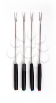 Set of fondue forks isolated on white
