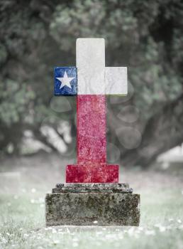 Old weathered gravestone in the cemetery - Texas