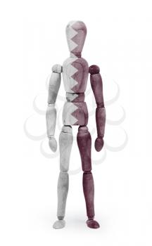 Wood figure mannequin with flag bodypaint on white background - Qatar