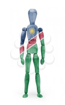 Wood figure mannequin with flag bodypaint on white background - Namibia