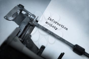 Close-up of a vintage typewriter, old and rusty, information society