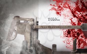 Bloody note - Vintage inscription made by old typewriter, YOLO