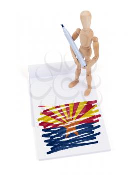 Wooden mannequin made a drawing of a flag - Arizona