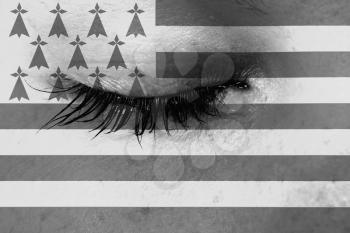 Women eye, close-up, tear, flag of Brittany