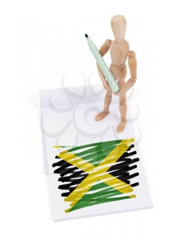 Wooden mannequin made a drawing of a flag - Jamaica