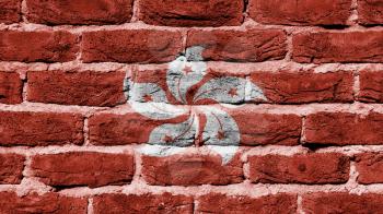 Very old dark red brick wall texture, flag of Hong Kong