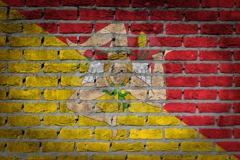 Dark brick wall texture - flag painted on wall - Sicily