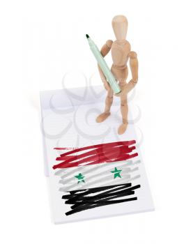 Wooden mannequin made a drawing of a flag - Syria