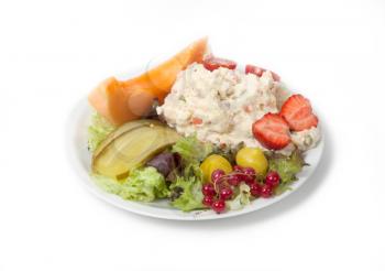 Snack time - View of Russian salad on a white plate, isolated