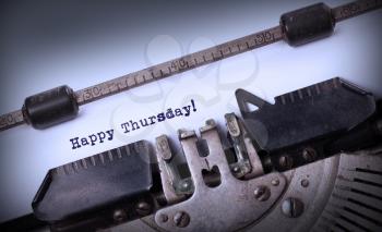 Vintage typewriter close-up - Happy Thursday, concept of motivation