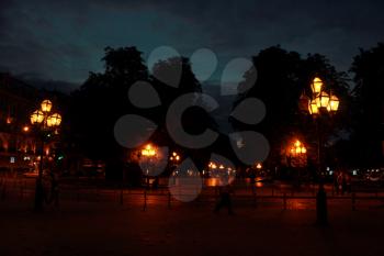 illuminated street of night Lviv city with many lanterns