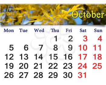 calendar for October of 2015 with the ribbon of yellow leaves