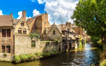 Panorama of canal in Bruges in a beautiful summer day, Belgium