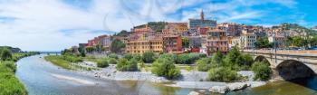 Panorama of Colorful houses in old town of Ventimiglia in a beautiful summer day, Italy