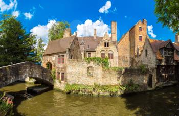 Panorama of canal in Bruges in a beautiful summer day, Belgium
