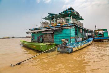 Chong Khneas floating village near Siem Reap, Cambodia in a summer day