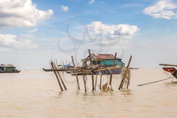 Chong Khneas floating village near Siem Reap, Cambodia in a summer day