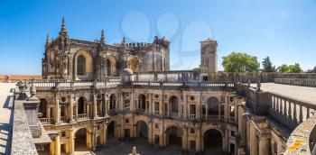 Central square of the inside medieval Templar castle in Tomar in a beautiful summer day, Portugal