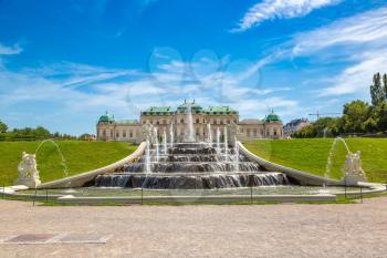 Fountain and Belvedere Palace in Vienna, Austria in a beautiful summer day