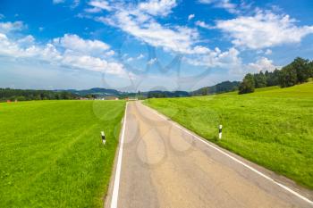 Asphalt road in Germany, Bavaria in a beautiful summer day