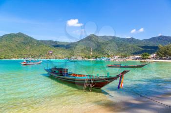 Traditional wooden fisherman boat on Koh Phangan island, Thailand in a summer day
