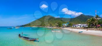 Panorama of Traditional wooden fisherman boat on Koh Phangan island, Thailand in a summer day