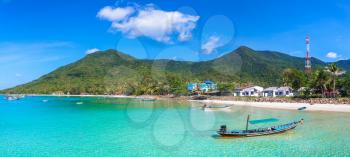 Panorama of Traditional wooden fisherman boat on Koh Phangan island, Thailand in a summer day