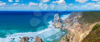 Cabo da Roca. Cliffs and rocks on the Atlantic ocean coast in Sintra in a beautiful summer day, Portugal