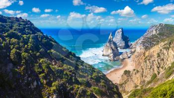 Cabo da Roca. Cliffs and rocks on the Atlantic ocean coast in Sintra in a beautiful summer day, Portugal