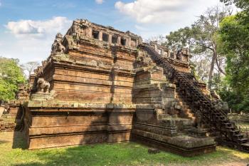 Phimeanakas temple ruins is Khmer ancient temple in complex Angkor Wat in Siem Reap, Cambodia in a summer day