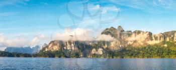 Panorama of Beautiful nature at Cheow Lan lake, Ratchaprapha Dam, Khao Sok National Park in Thailand in a summer day