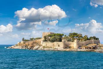 Pirate castle on Pigeon Island in Kusadasi, Turkey in a beautiful summer day