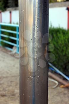 Close up of shiny metal pipe