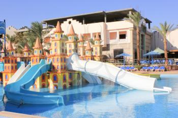 Water Slides at the Water Aquapark. Water Park for Kids at Sun Light. 