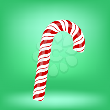 Sweet Candy Cane Isolated on Green Background