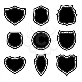 Set of Different Shields Silhouettes Isolated on White Background