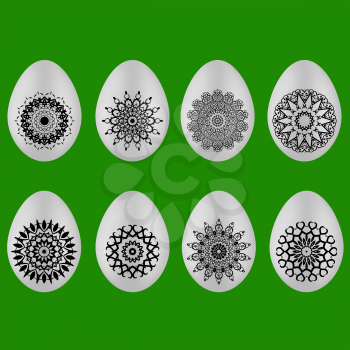 Set of Easter Eggs with Different Ornaments Isolated on Green Background