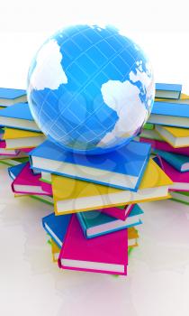 Colorful books and earth on a white background