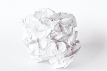 Photo of crumpled paper ball on white background