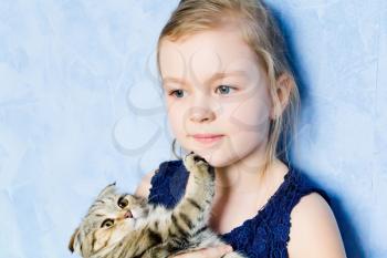 Image of beautiful girl with grey kitty