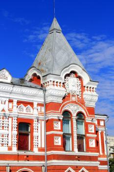 Town landscape with historic theatre and blue sky