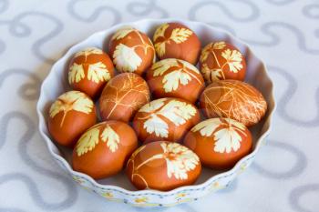 Photo of Twelve Easter eggs on white background