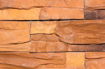 Photo stone wall of red masonry texture