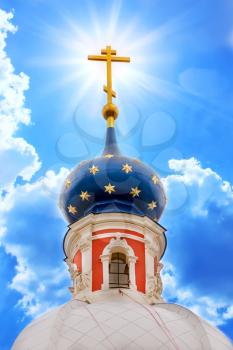 Russian province orthodoxy church in blue sky with sunlight