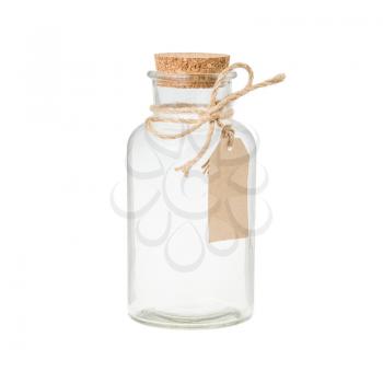 Empty vintage bottle with label and cork isolated on white