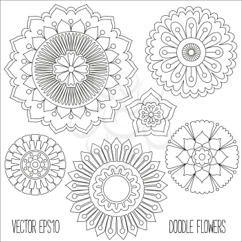 Doodle flowers set. Hand drawn isolated graphic elements. Boho and ethnic style mandala. Decorative art for birthday cards, wedding and baby shower invitations, scrapbooking etc. Vector illustration.