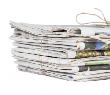 Pile of newspapers, tied with a string